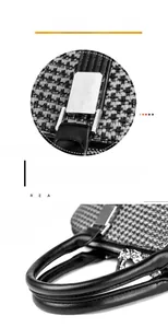 Detailed view of houndstooth fabric texture and silver hardware on the women's handbag