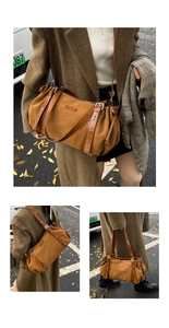 Detail view of large brown vintage tote bag with leather straps and silver buckle adjustment