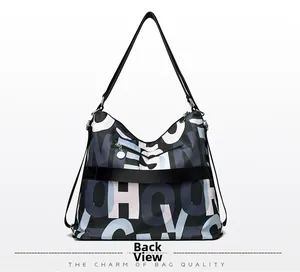 Back view of high-capacity nylon tote bag featuring modern abstract letter print patterns
