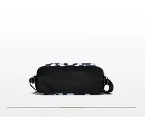 Detail view of the flat black wear-resistant base and colorful printed pattern on nylon bag