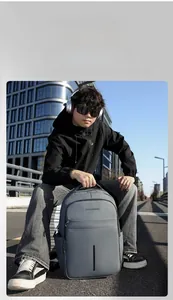 Grey waterproof business laptop backpack with multiple compartments for urban commuting