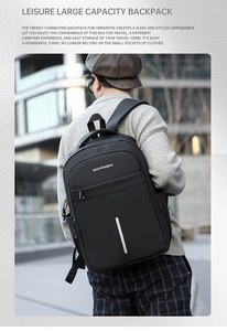 Close-up of waterproof backpack with silver reflective strip and brand logo in city setting