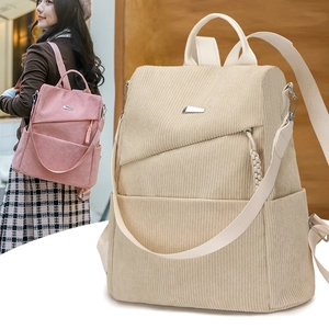 Minimalist corduroy women's backpack in pink and white with stylish metallic accents