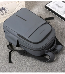 Detail of waterproof matte dark grey business backpack with breathable mesh straps