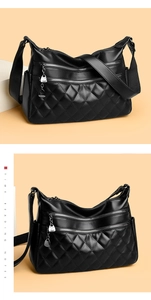 Detail of black pebbled leather bag with quilted pattern and kangaroo metal charm
