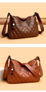 Close-up of quilted leather bags with silver BLDS metal pendants and multi-zipper pockets