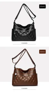Detail view of large faux leather bags in black and brown with quilted pattern and heart charm