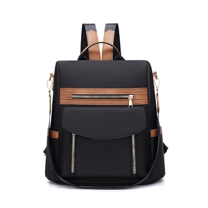 Damenrucksack aus schwarzem Oxford-Nylon mit braunem Lederbesatz und Reißverschlusstaschen