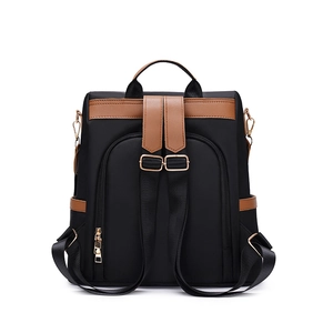 Damenrucksack aus schwarzem Oxford-Nylon mit braunem Lederbesatz und Goldzipper