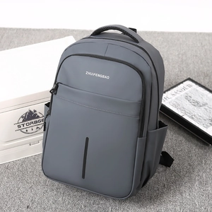 Waterproof grey business laptop backpack with large capacity for travel and outdoor use