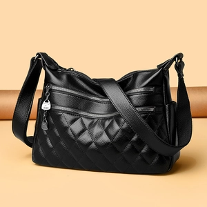 Black quilted leather shoulder bag with triple zipper pockets and kangaroo pendant