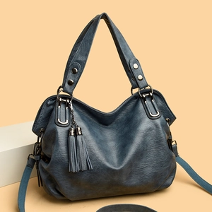 Women's vintage blue leather tote bag with tassels and detachable shoulder strap