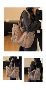 Detail view of large brown corduroy tote bag with side zipper pockets for daily commute