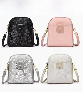 Minimalist snakeskin crossbody bags in black, pink, off-white and silver colors