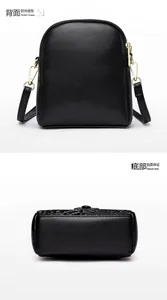 Minimalist black PU crossbody bag showing clean back view and snake pattern texture detail