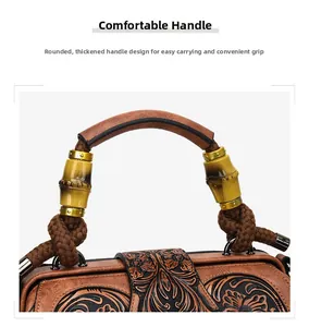 Detailed macro view of the vintage brown floral embossed leather and unique bamboo handle