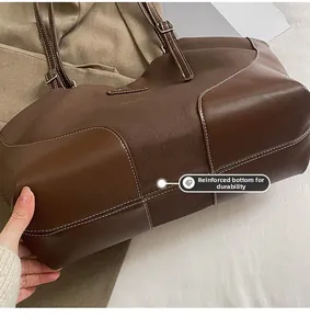Detail view of thickened wear-resistant bottom on retro large capacity tote bag