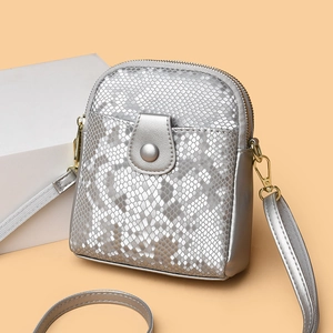 Silver snakeskin print leather crossbody bag with adjustable strap and golden hardware