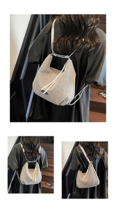 Detailed views of gray leopard print shoulder bag with sleek straps on a model