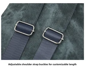 Detail of adjustable metal buckles and corduroy straps on the gray casual backpack