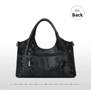Detailed back view of black snake pattern leather bag featuring a functional zip pocket