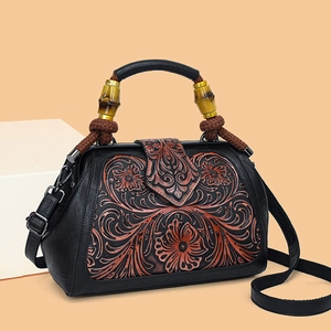 Retro contrast handbag with wooden handle and floral embossed leather design