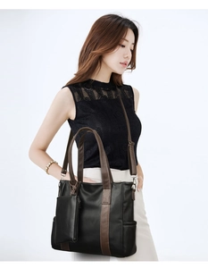 Detail of soft leather tote bag with side pocket and detachable small coin purse