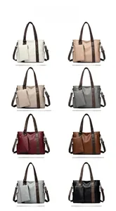 Color options of soft faux leather tote bags with matching small pouch attachments