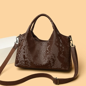 Brown snake pattern faux leather tote bag with top handles and adjustable shoulder strap