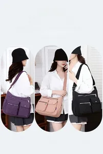 Detailed view of quilted nylon crossbody bags in purple, pink and black colors