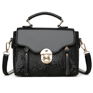 Black faux snake leather crossbody bag for women with gold clasp and top handle