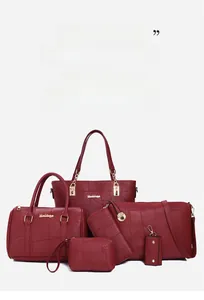 Close-up of wine red six-piece bag set with premium embossed crocodile texture