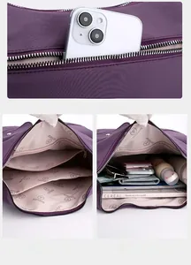 Detail view of purple nylon crossbody bag with multi-layer pockets and rear zip
