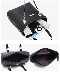 Interior view of black tote bag showing large capacity for tablet and accessories