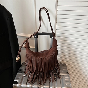 Vintage dark brown suede hobo bag with fringe tassels and crescent moon shape