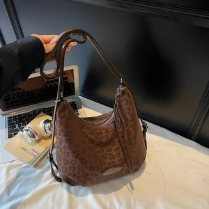 Brown leopard print Hobo shoulder bag with suede texture and dark leather strap