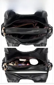 Vue interne du sac bandoulière noir minimaliste avec deux compartiments zippés