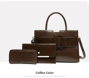 Detailed view of the 3-piece coffee brown bag set with handbag, pouch and crocodile wallet