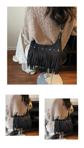 Detail einer schwarzen Wildleder-Fransentasche mit silbernen Sternnieten und Boho-Quasten