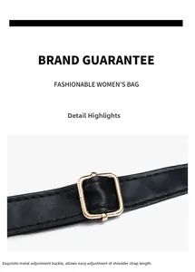 Macro shot of adjustable black leather shoulder strap with gold metal hardware buckle