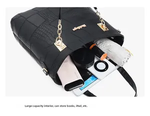 Detailed top view of large black textured tote interior showing spacious storage capacity