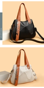 Détail du cuir texturé litchi et des plis en tricot sur ce sac cabas élégant