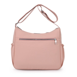 Pink waterproof nylon crossbody bag for women with multiple zipper pockets and adjustable strap