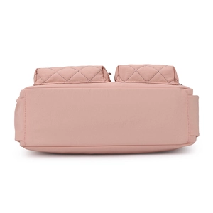 Bottom view of large capacity light pink nylon crossbody bag with quilted rhombic texture