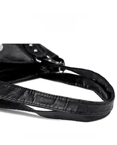 Detail of black pebbled leather texture with silver rivets and double-stitched handle