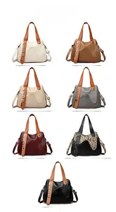 Présentation des sacs fourre-tout rayés avec sept options de couleurs élégantes pour femmes