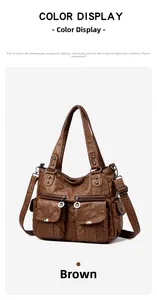 Detailed view of deep brown vintage motorcycle bag with multiple pockets and silver zippers