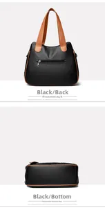 Vue détaillée du sac cabas noir à motif litchi avec anses marron et poche arrière zippée