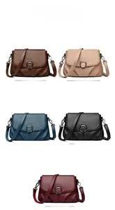 Collection of textured leather crossbody bags with metal ring buckles in five colors