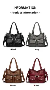 Close-up of four colors of retro soft leather motorcycle bags with multiple zippers